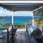 Outdoor kitchen with an ocean view at a luxury villa in St. Barts, Caribbean.