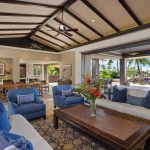 Luxury villa interior with elegant furniture and ocean view in Hawaii.